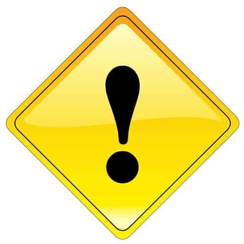 Yellow diamond safety sign with large black exclamation mark