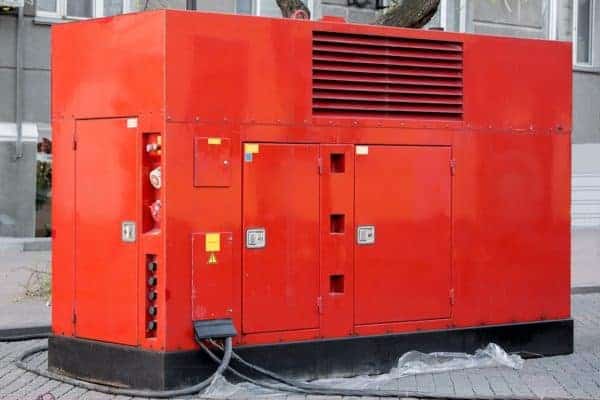 Mobile electric power generator for emergency situations, red color on outdoor.